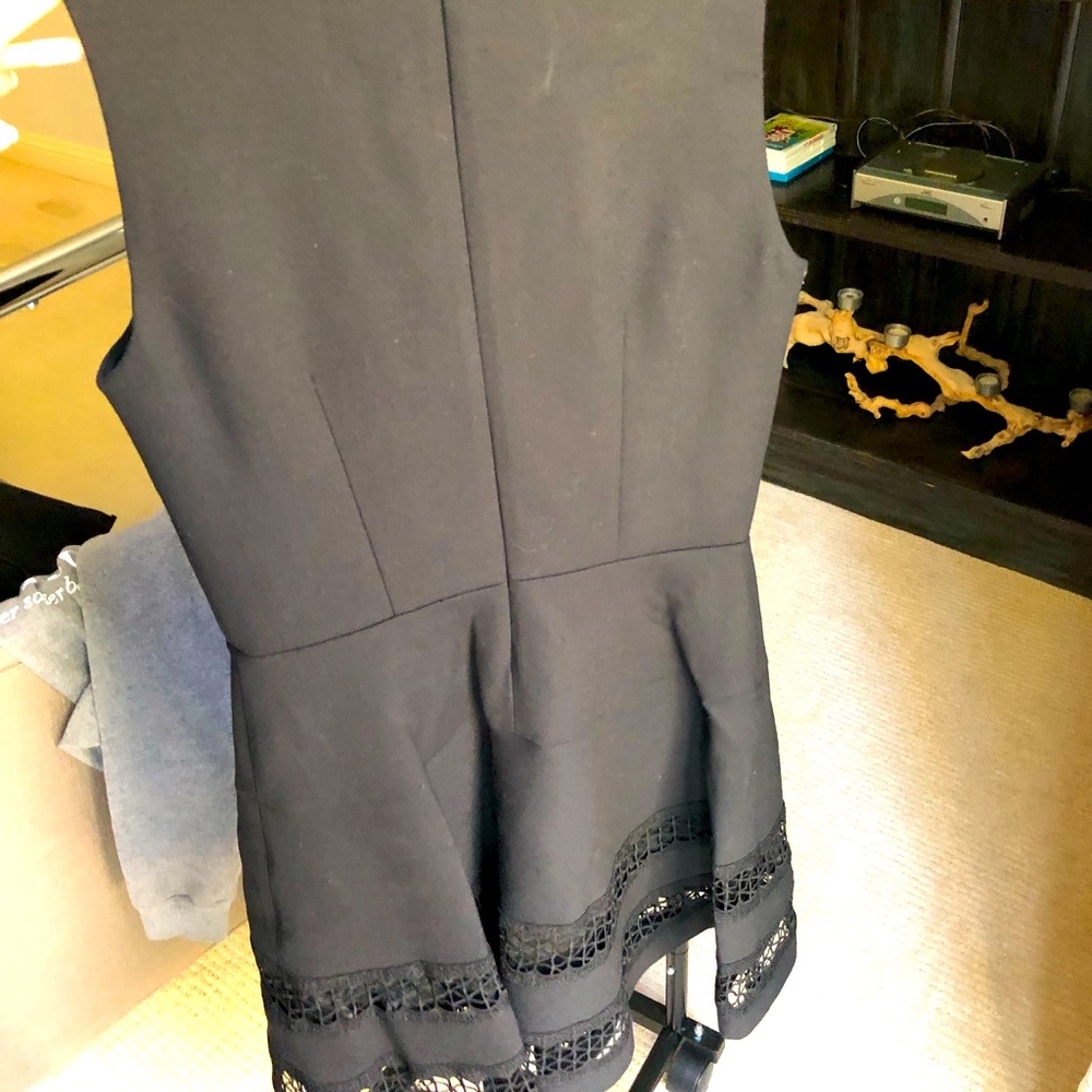 Black midi length dress with lace trim